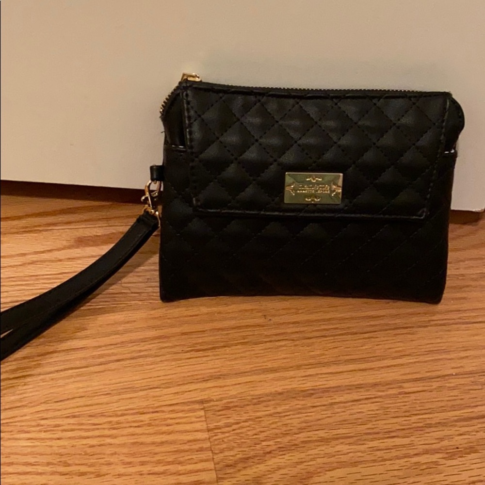 Nanette Lepore clutch that charges phones